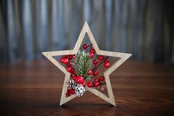 Wooden Star Decoration with Pine and Berries