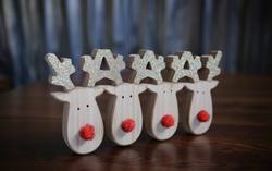 Table Decoration with Four Reindeer - Red Noses
