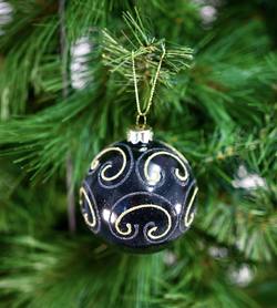 Black Glass Ball with Gold Swirl Pattern